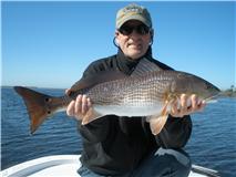 Cold water, low tide flats fishing for redfish and speckled trout.